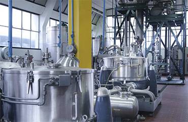 A spacious industrial room filled with diverse equipment for various purposes