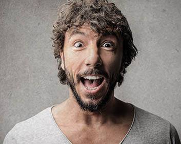 a man with a beard and mouth open